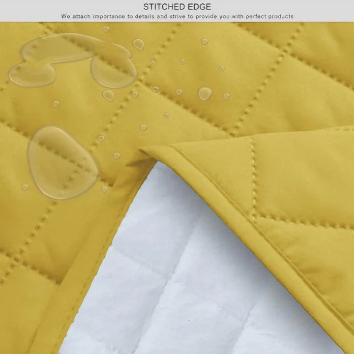 beige waterproof quilted sofa cover